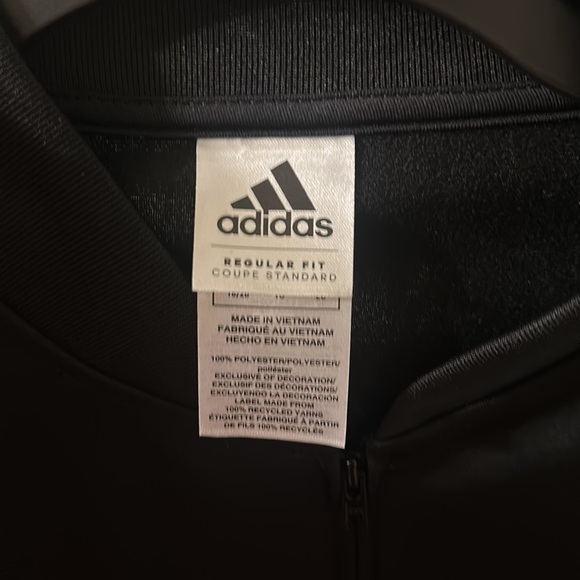 Black hoodie with gold,blue and green stripes on sleeve - Picture 4 of 7